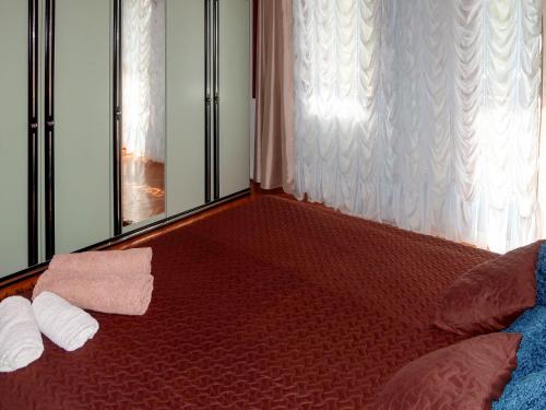a room with a bed with two towels on it at Holiday Home Noel by Interhome in Raša