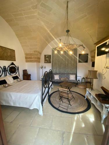 Cama o camas de una habitación en Masseria li Vecchi