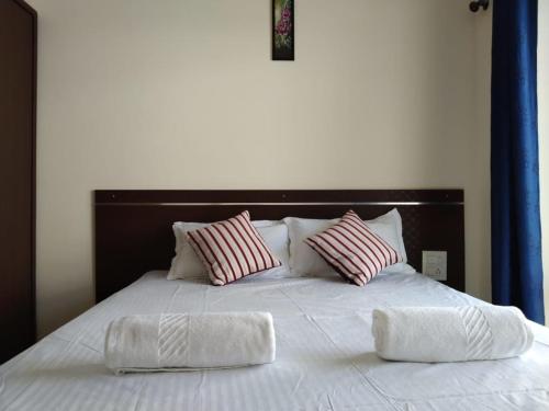 Katil atau katil-katil dalam bilik di 1 BHK Apartment for rent in Varca - We Comforts
