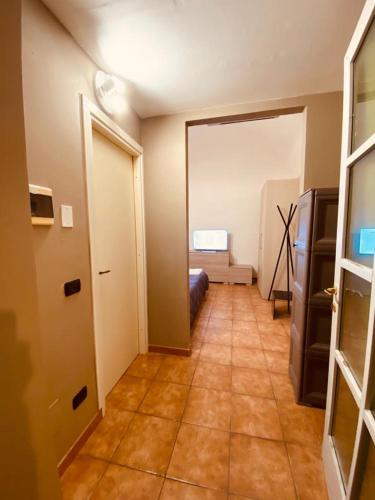 a room with a hallway with a room with a room at HH Hermoso Housing VALENZA in Valenza