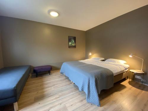 Cama o camas de una habitación en Dalshöfdi Guesthouse