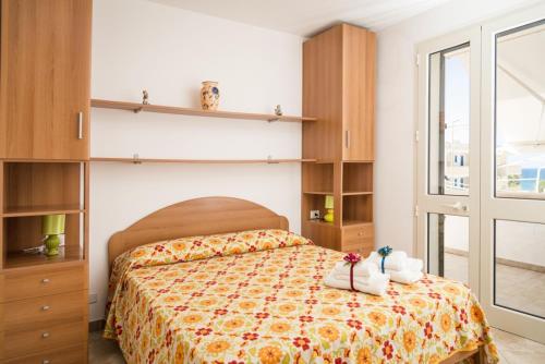 Postel nebo postele na pokoji v ubytování Salento Cecilia - solo settimane intere da sabato a sabato