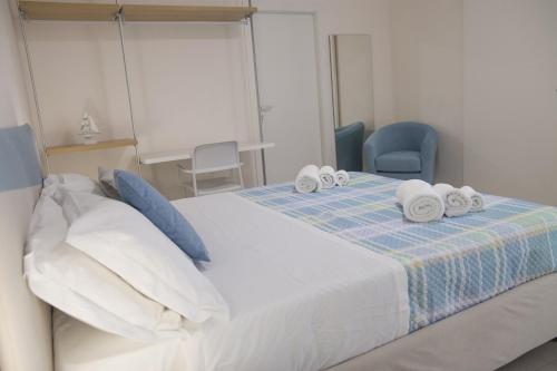 Postel nebo postele na pokoji v ubytování Villa Sabbie D'Oro
