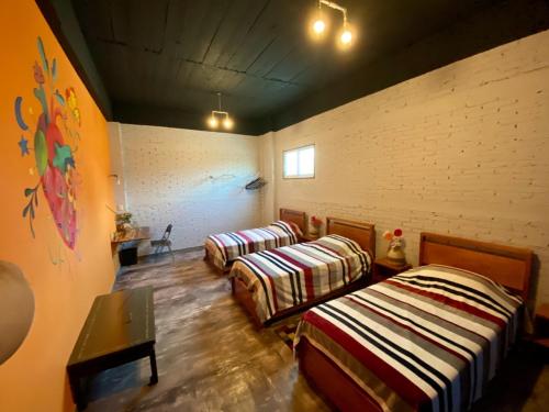 Postel nebo postele na pokoji v ubytování Diaza Rooms Center of Oaxaca