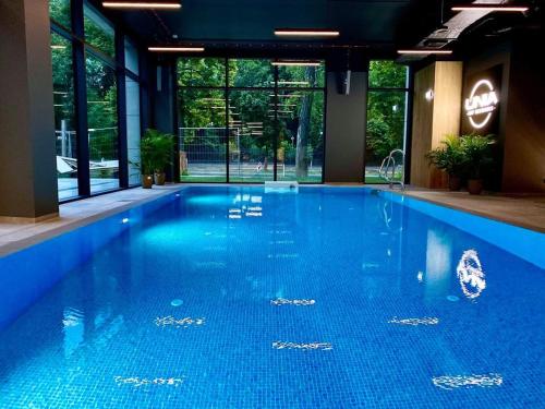 Bazén v ubytovaní Apartament Unia 12 Basen&SPA alebo v jeho blízkosti