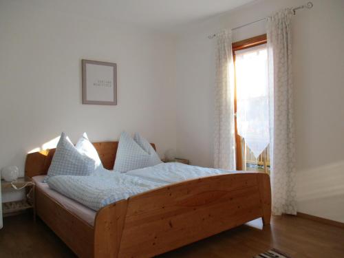 Postel nebo postele na pokoji v ubytování Haus am Dorfplatz