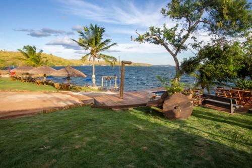 a view of the water from a resort with a deck at Hotel Fazenda Monte Cristo in Piranhas