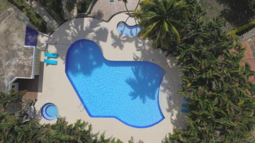 an image of a swimming pool at a resort at ATENEA SPA Hotel in Villeta