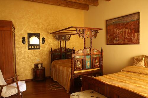 A bed or beds in a room at Bed and Breakfast Angolo Fiorito