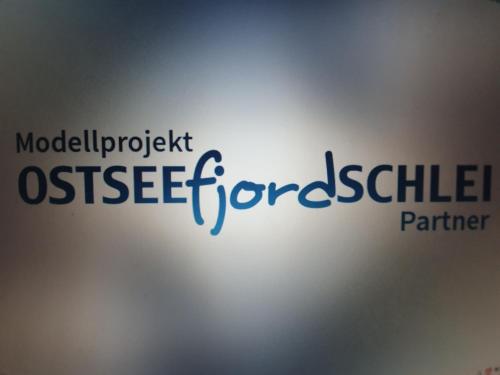 a sign that reads molecularrocket osseflectheasternhibitederatedaindainarer at Fräulein Emma Lotta in Kronsgaard