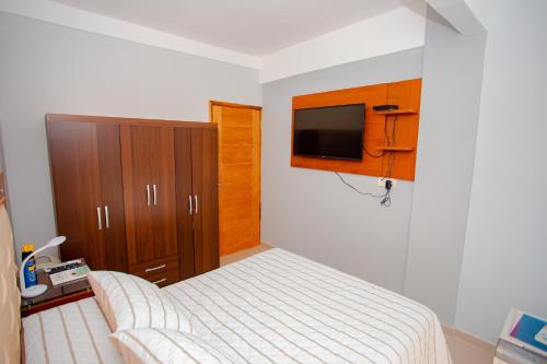 Postel nebo postele na pokoji v ubytování Asuncion Soho - Departamentos