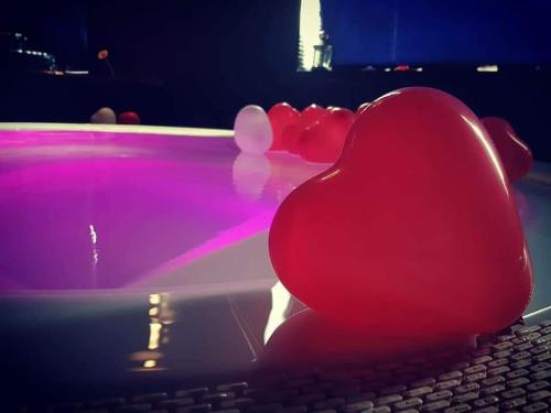 a red heart sitting on top of a keyboard at Christian's Suites & Spa in Fasano
