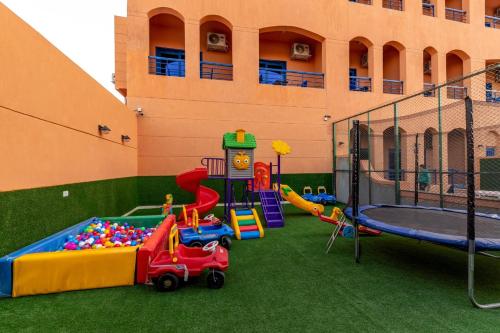 a playground with many different types of play equipment at Royal Day Plaza Hotel in 6th Of October