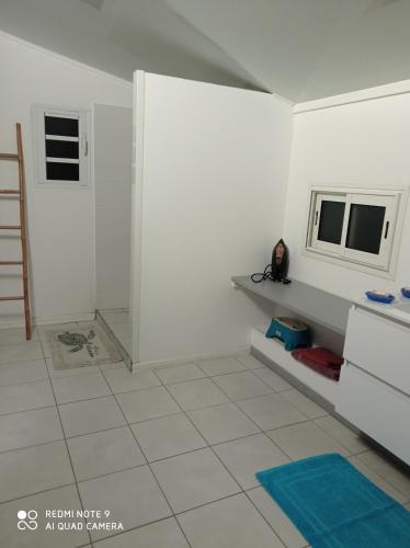 TV a/nebo společenská místnost v ubytování Gîte Holidays mon repos