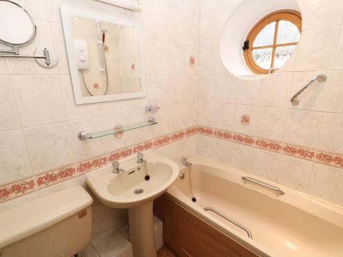 Et badeværelse på Lavender Cottage