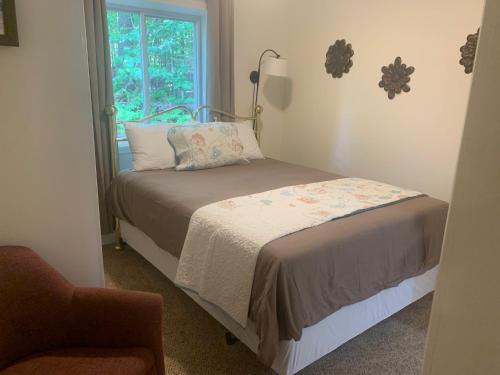 Кровать или кровати в номере Green Mountain Cabins