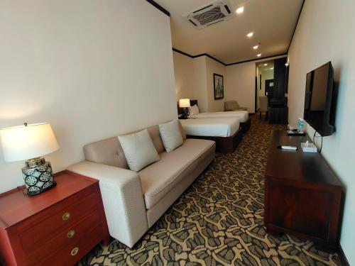 Телевизор и/или развлекательный центр в Riviera Suites Melaka