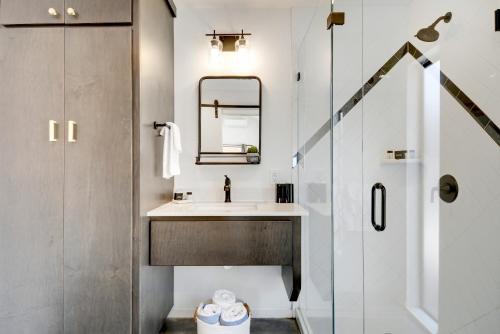 a bathroom with a sink and a mirror at Lucky Arrow Retreat in Dripping Springs