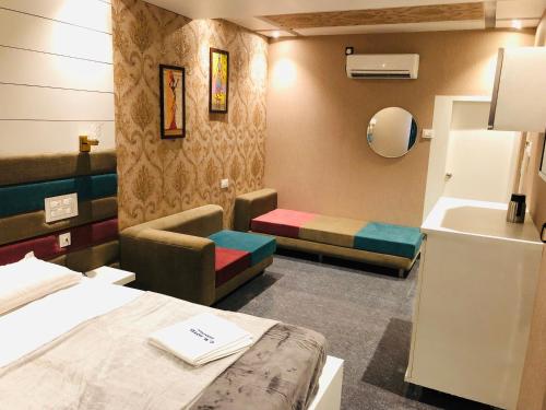 Postel nebo postele na pokoji v ubytování C M HOTEL NEW