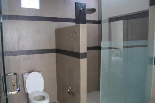 Kylpyhuone majoituspaikassa Ketut Villa Sanur