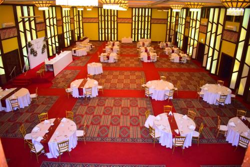 an overhead view of a banquet hall with tables and chairs at Safari Park Hotel in Nairobi