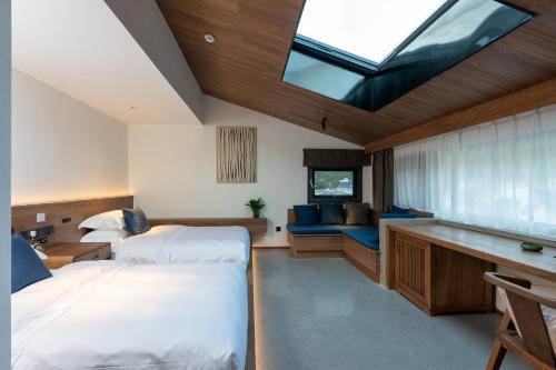 Ένα ή περισσότερα κρεβάτια σε δωμάτιο στο A Villa in a valley