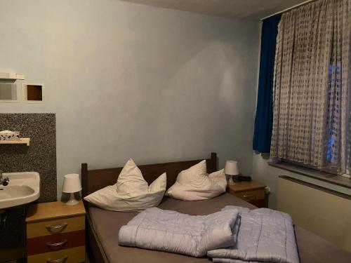 Postel nebo postele na pokoji v ubytování Haus an der Diemel