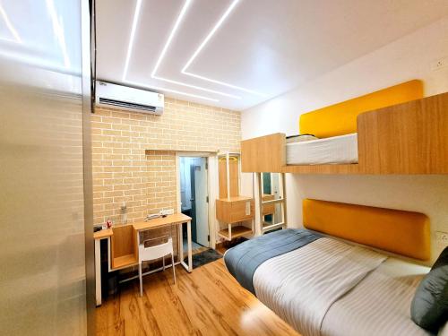 Postel nebo postele na pokoji v ubytování Stay Inn