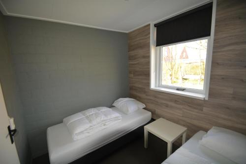 Cama o camas de una habitación en Zeekraal