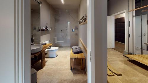 a bathroom with a sink and a toilet at Port of Travemünde, Opening 2021 in Travemünde