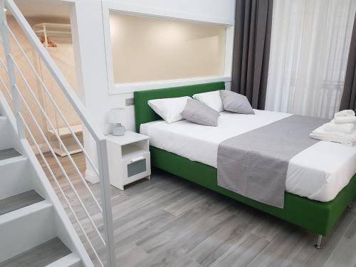 Posteľ alebo postele v izbe v ubytovaní Duomo Platinum Apartments