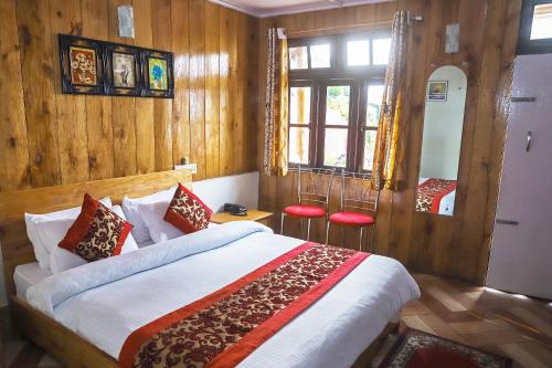 Krevet ili kreveti u jedinici u okviru objekta Dungmali Heritage Resort