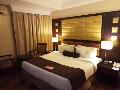 Giường trong phòng chung tại Room in Lodge - Owu Crown Hotel, Ibadan
