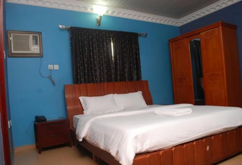 Llit o llits en una habitació de Room in Lodge - Owees Place-okota