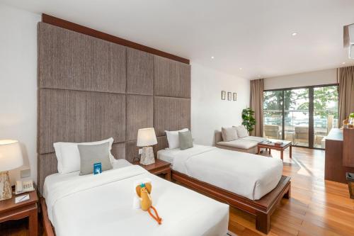 Katil atau katil-katil dalam bilik di Baan Laimai Beach Resort & Spa - SHA Extra Plus