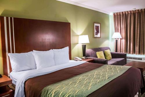 Ένα ή περισσότερα κρεβάτια σε δωμάτιο στο Days Inn by Wyndham Austintown