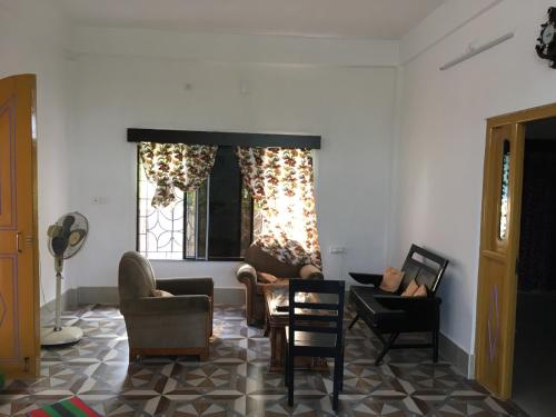 Posezení v ubytování Vamoose S Das Homestay