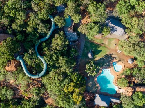 an overhead view of a river in a forest at Dikhololo in Brits