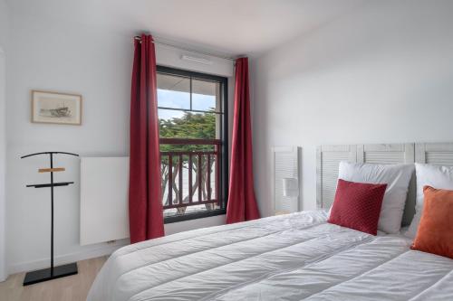Ліжко або ліжка в номері Esprit villa balneaire sur la cote bretonne pour trois personnes