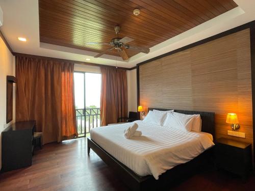 Ένα ή περισσότερα κρεβάτια σε δωμάτιο στο Home Sweet Villas, Karambunai