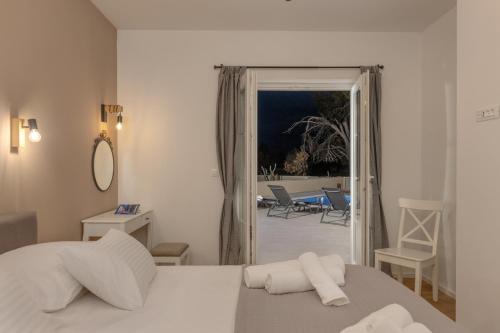 Ένα ή περισσότερα κρεβάτια σε δωμάτιο στο Villa Mediterra Prima