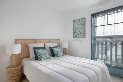 Ліжко або ліжка в номері Votre appartement en bord de plage de Val Andre