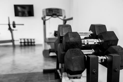 a row of parking meters in a gym at Airport Planet Lodge in Kingori