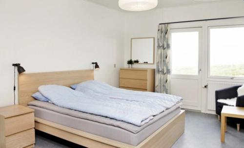 Postel nebo postele na pokoji v ubytování Beachfront Retreat E 2 Bedrooms Sea View