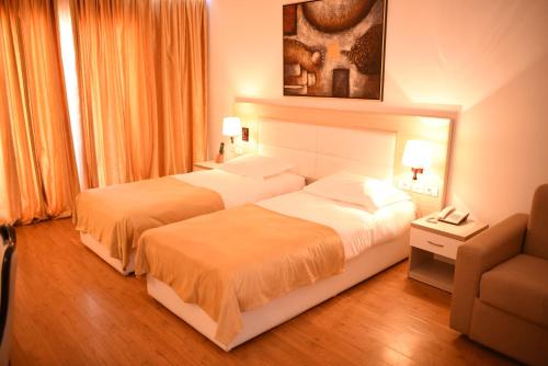 Postel nebo postele na pokoji v ubytování Hotel Bleart