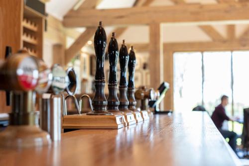 a chess set on top of a wooden table at The Ferry Boat Inn in North Fambridge