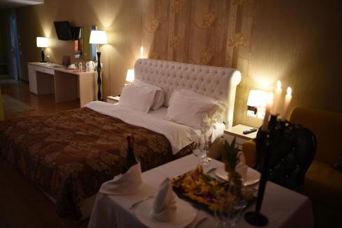 Postel nebo postele na pokoji v ubytování Hotel Bleart