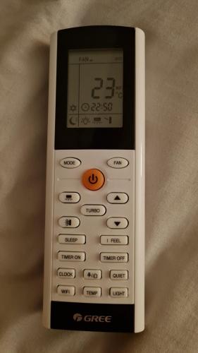 a remote control sitting on top of a table at Anna villa in Lenti