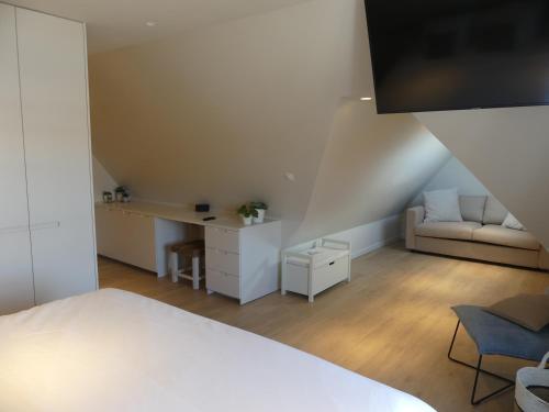 Posteľ alebo postele v izbe v ubytovaní Vakantiewoning De Nachtegaal