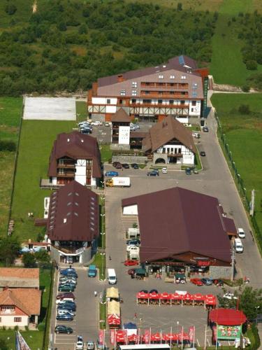 an aerial view of a parking lot with a building at New Wolf in Bran